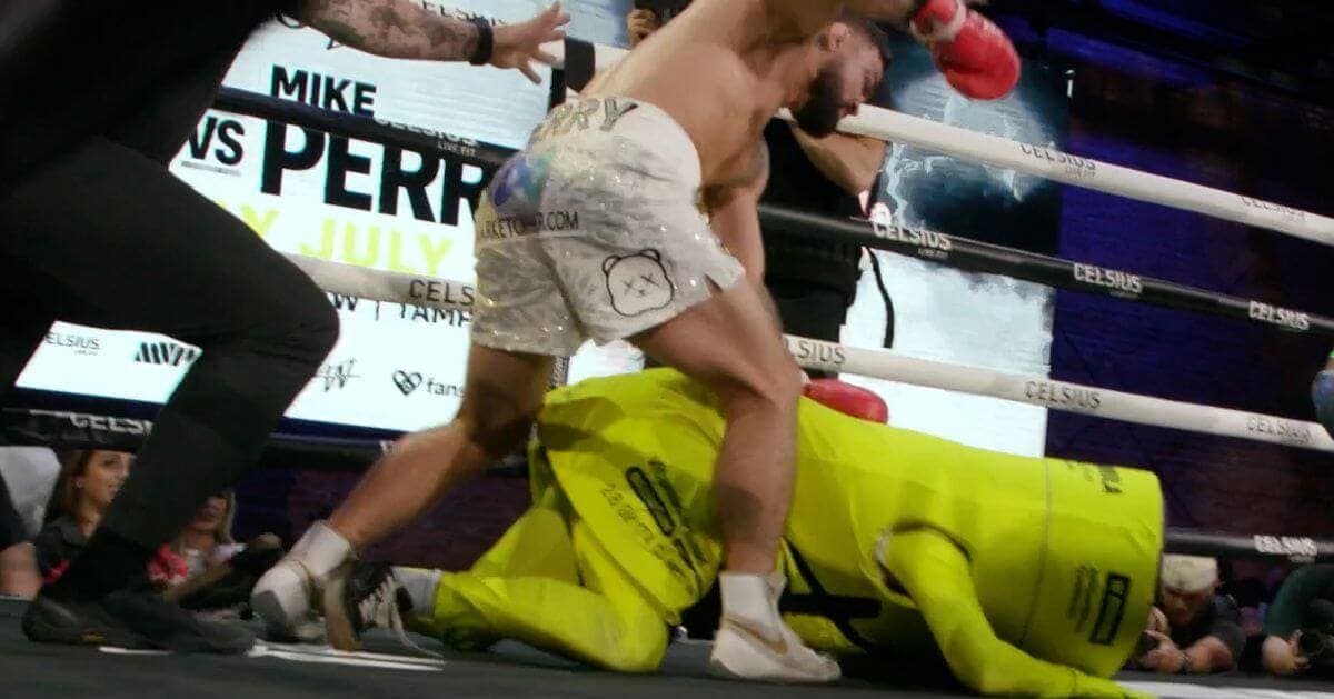 Mike Perry Beats Up Jake Paul's Mascot; Security Separates Him