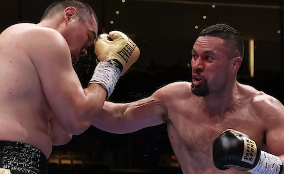 Parker Survives Two Knockdowns To Beat Zhang Via A Majority Decision