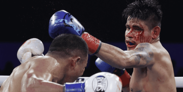 Navarrete Beats Suarez In Controversial Technical Decision